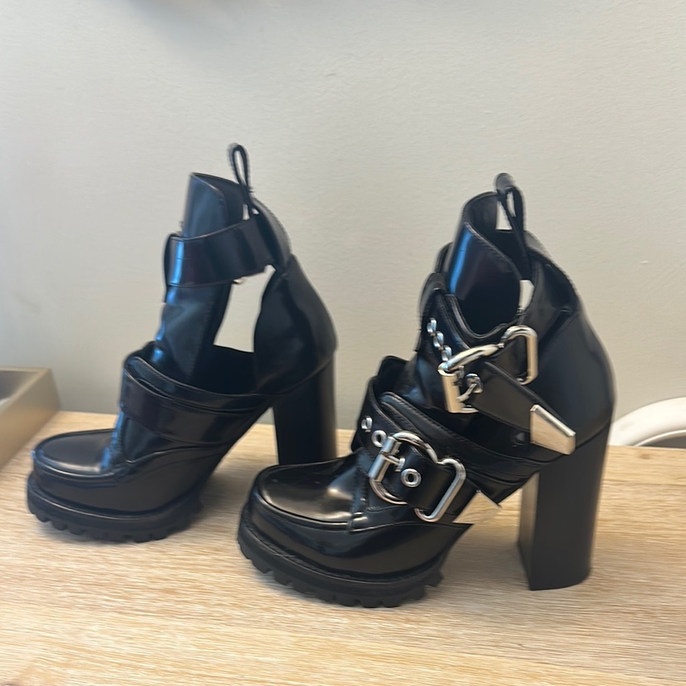 Sleek Black Moto Boots with Buckle Detail